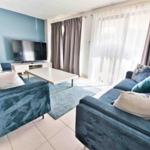 Nelson Bay Breeze Apartment – Bright Coastal Lounge with Balcony Access